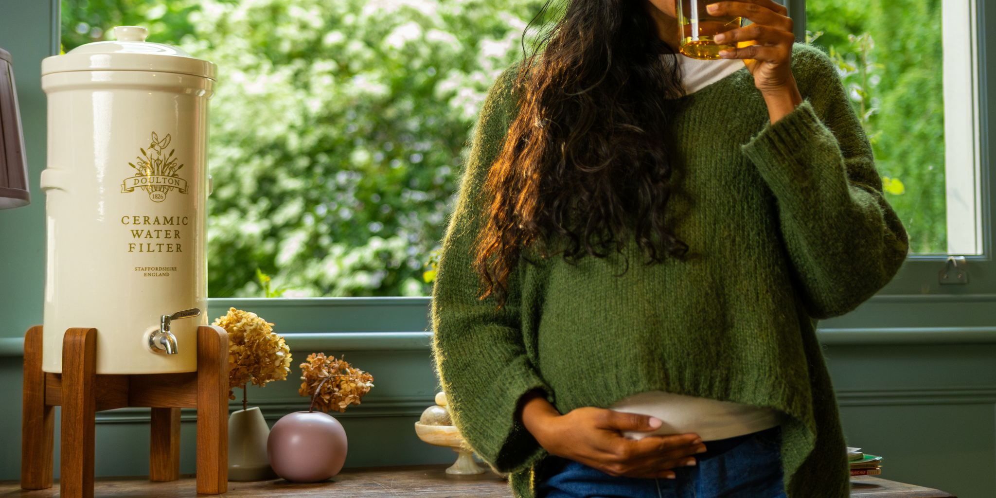 pregnant woman drinking water