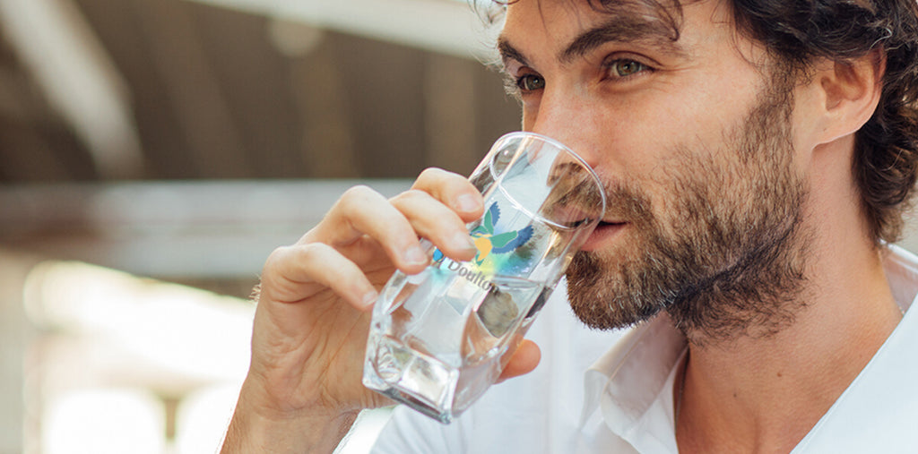 Stick To Your New Year's Resolutions: How Drinking Water Can Help