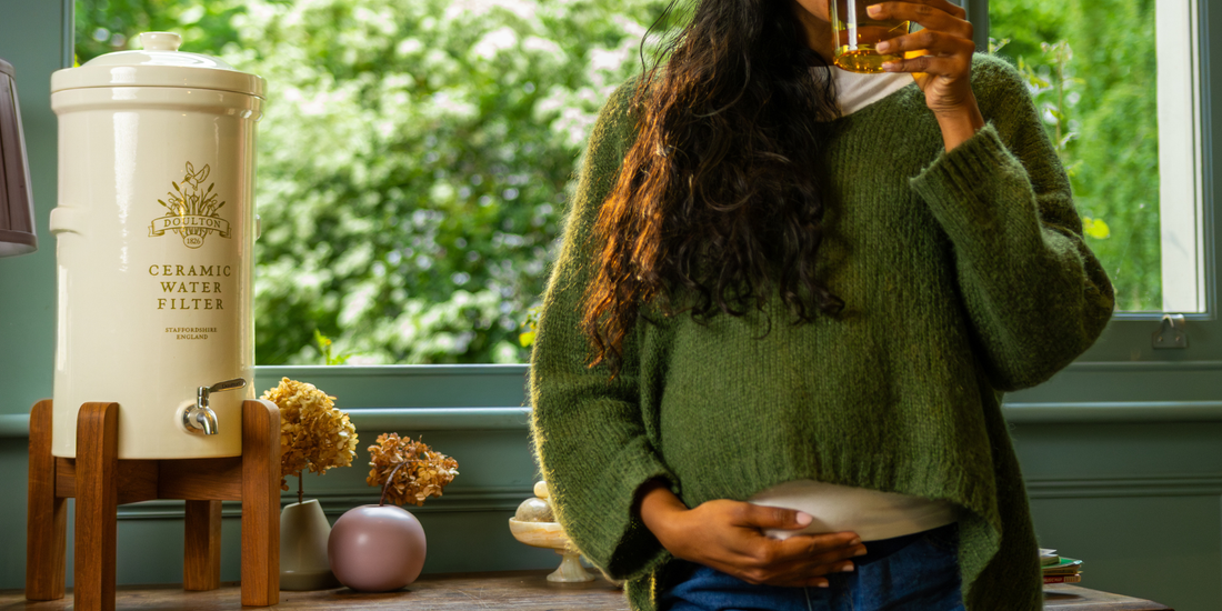 pregnant woman drinking water