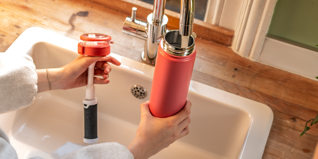 bottle being filled from tap