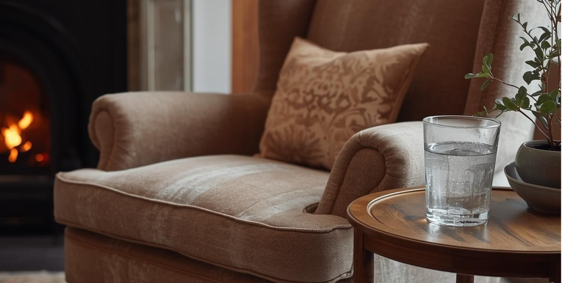 cosy living room with water on table