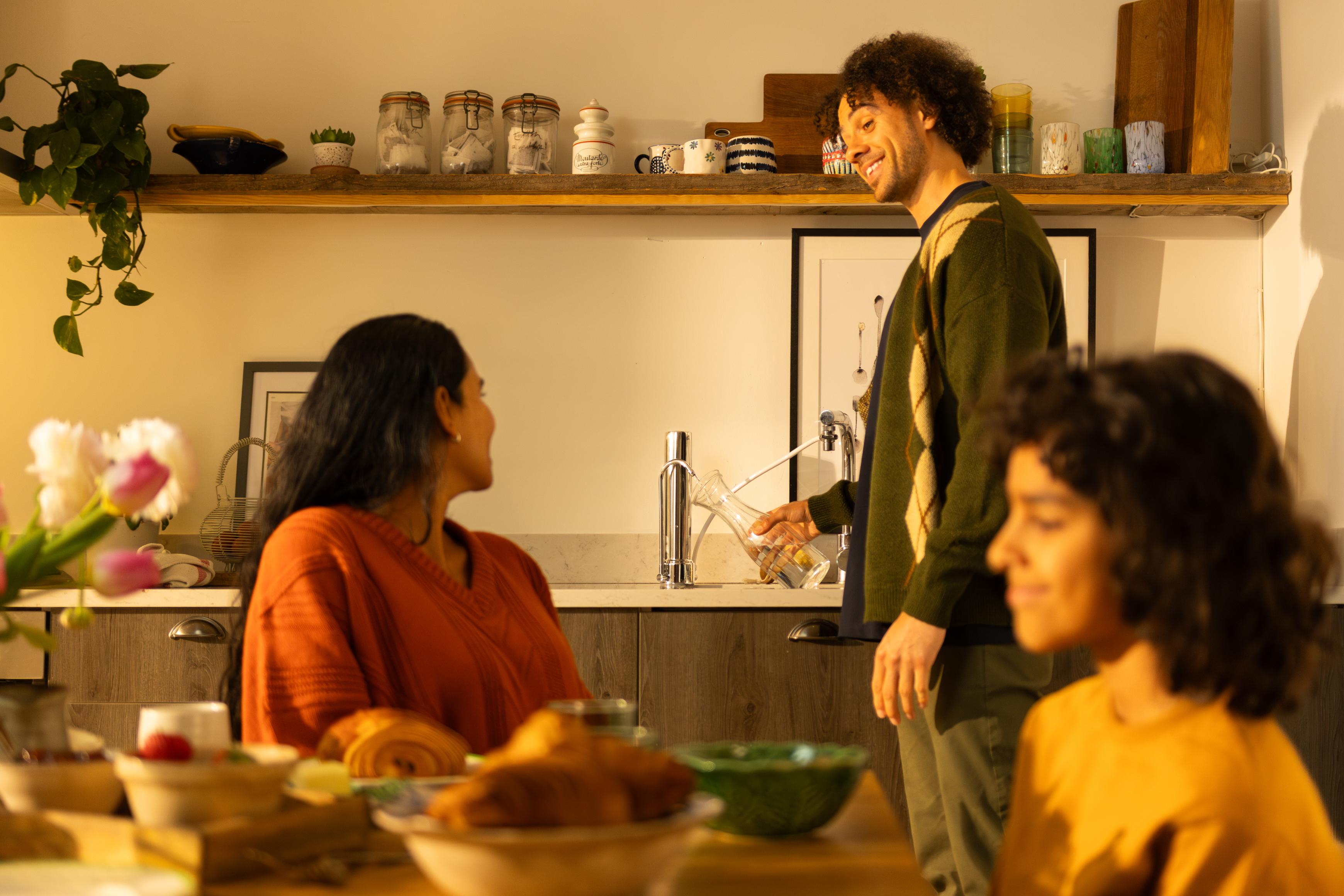 filing up a jug from countertop water filter