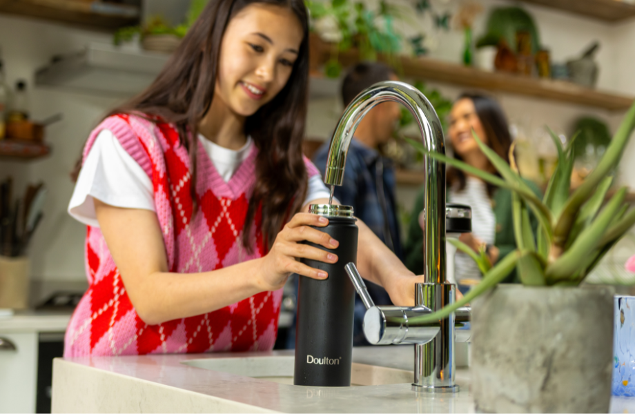 girl filling up a Doulton taste 2 water bottle