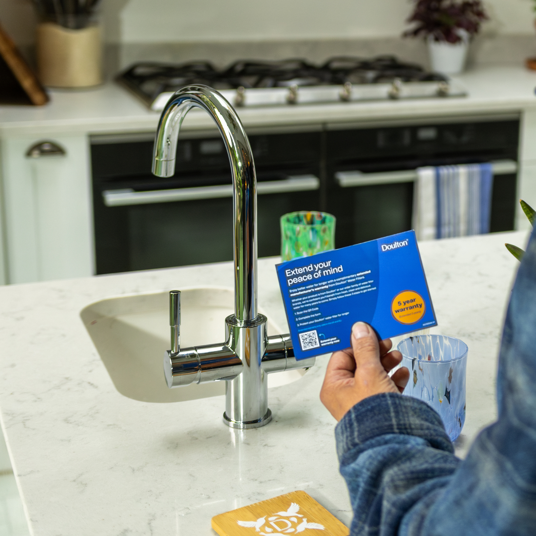 An image of a tap with the 5 year warranty 