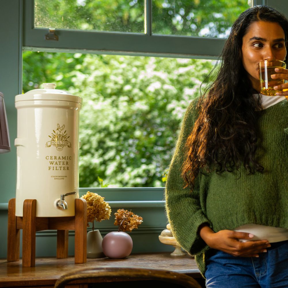  pregnant woman drinking a glass of water