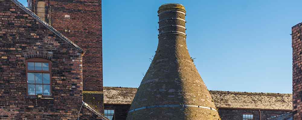  A kiln used for firing pottery in a pottery workshop, representing Doulton's roots.